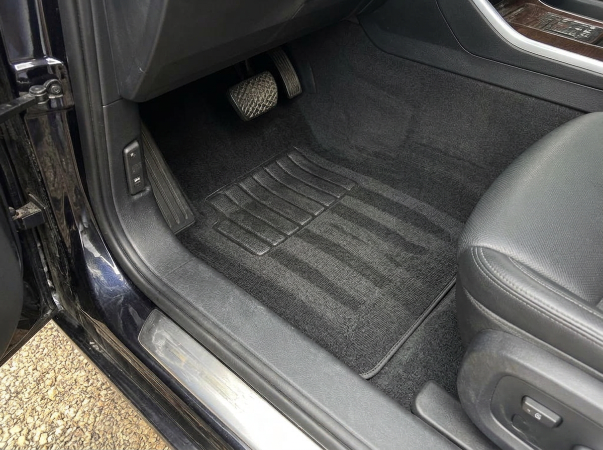 Driver's Floor & Carpet — after professional detailing